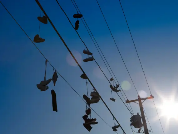 What Do Shoes On Power Lines Mean